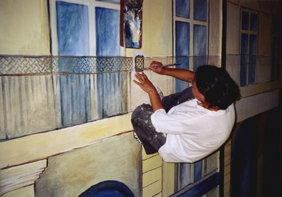 Sylvie Christophe pr�parant la mise en espace de l'exposition L'Ecole d'Alger, BFM, Limoges, 2003.